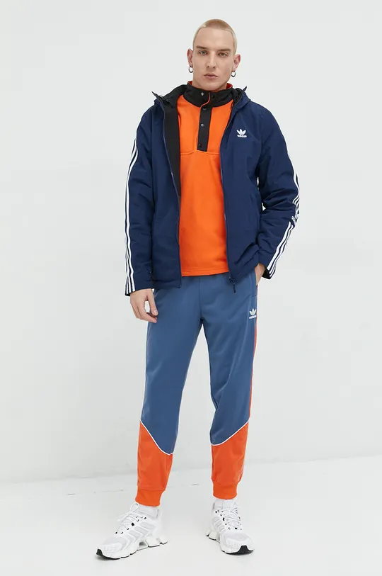 Adidas Originals kifordítható dzseki  Anyag 1: 100% Újrahasznosított poliamid Anyag 2: 100% Újrahasznosított poliészter