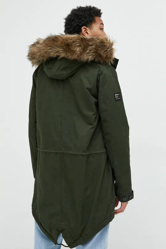 Superdry parka Materiał zasadniczy: 100 % Bawełna, Podszewka: 100 % Poliester, Wypełnienie: 100 % Poliester, Sztuczne futerko: 44 % Akryl, 42 % Modakryl, 14 % Poliester