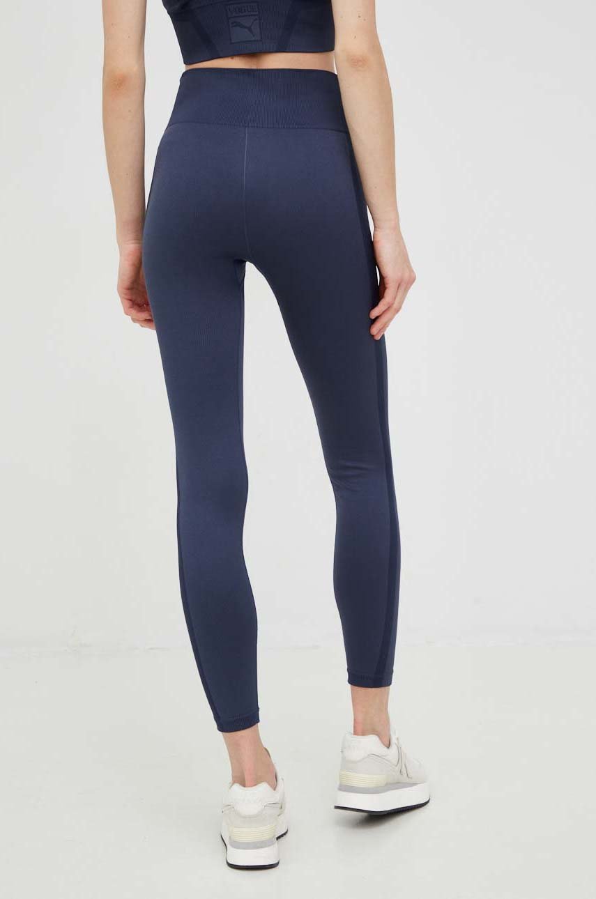 Legíny Puma x VOGUE  Materiál č. 1: 96 % Nylon, 4 % Elastan Materiál č. 2: 89 % Nylon, 11 % Elastan