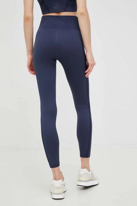 Puma legging x VOGUE  Anyag 1: 96% nejlon, 4% elasztán Anyag 2: 89% nejlon, 11% elasztán