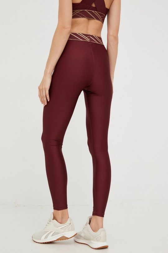 Puma edzős legging Deco Glam  Jelentős anyag: 77% poliészter, 23% elasztán Szegély: 51% nejlon, 49% poliészter