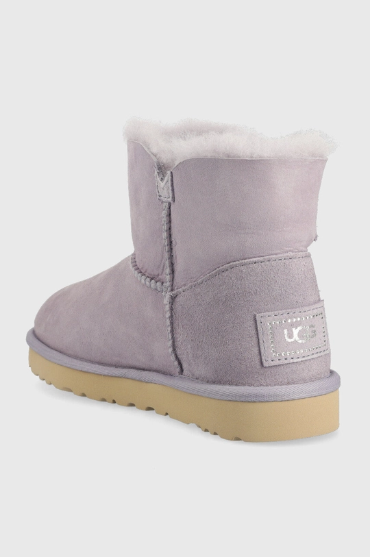 Μπότες χιονιού σουέτ UGG W Mini Bailey Button Bling  Κύριο υλικό: Δέρμα σαμουά Εσωτερικό: Υφαντικό υλικό, Μαλλί Σόλα: Συνθετικό ύφασμα