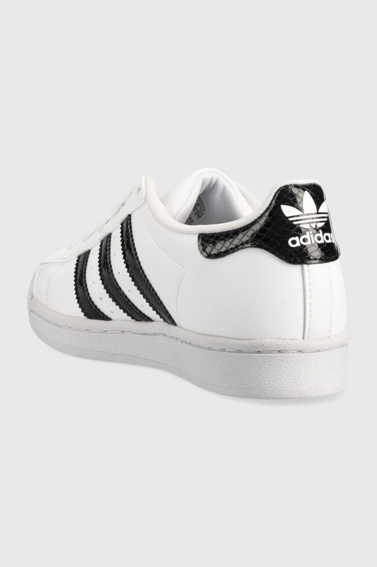 Παιδικά αθλητικά παπούτσια adidas Originals Superstar J <p> Πάνω μέρος: Συνθετικό ύφασμα Εσωτερικό: Υφαντικό υλικό Σόλα: Συνθετικό ύφασμα</p>