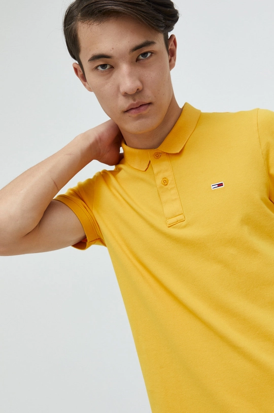 Polo majica Tommy Jeans zlatna