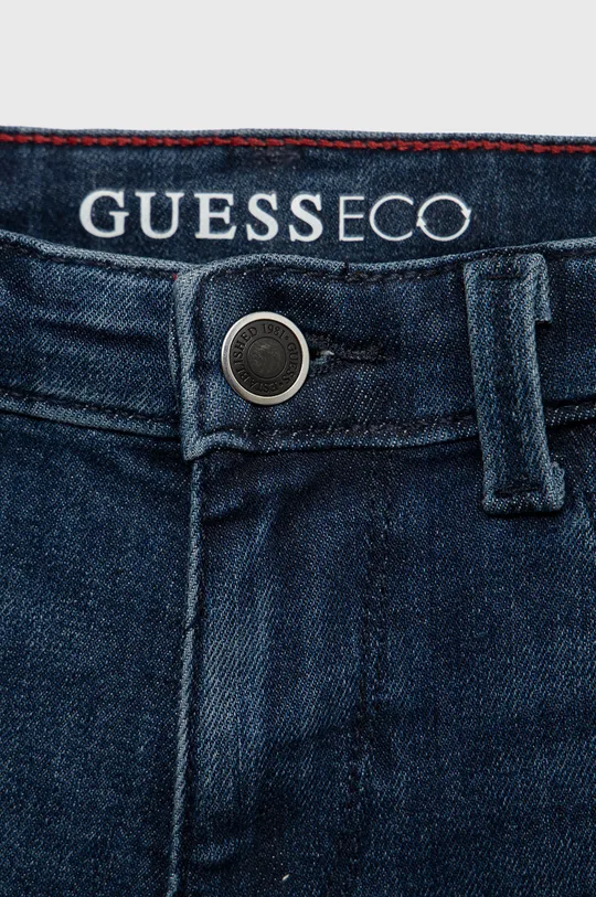 Παιδικά τζιν Guess  Κύριο υλικό: 92% Βαμβάκι, 7% Ελαστομυλίστερ, 1% Σπαντέξ Φόδρα: 75% Πολυεστέρας, 25% Βαμβάκι