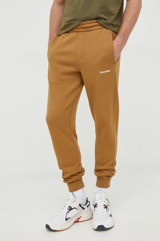 коричневий Спортивні штани Calvin Klein Чоловічий