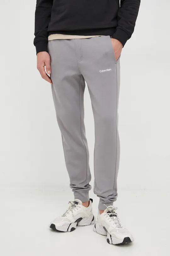 сірий Спортивні штани Calvin Klein Чоловічий