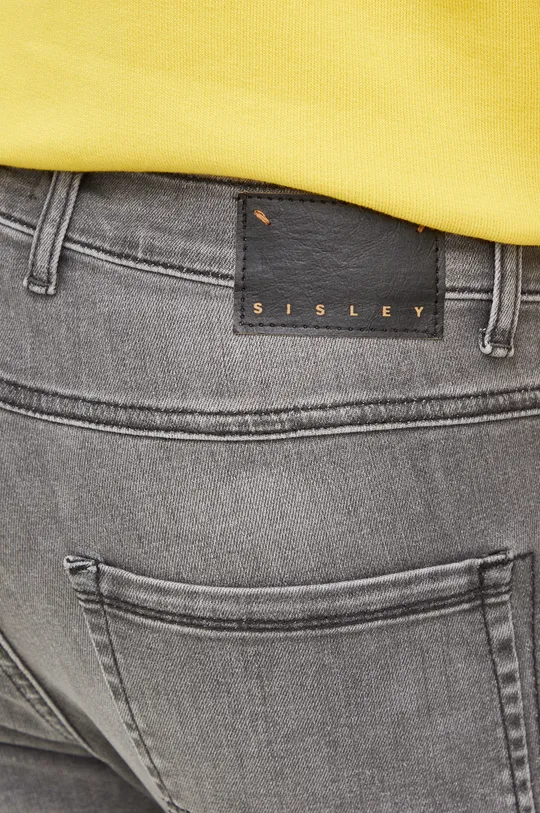 szary Sisley jeansy