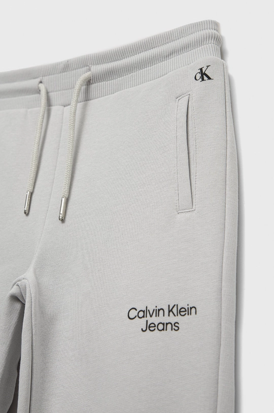 Detské tepláky Calvin Klein Jeans  85% Bavlna, 15% Polyester