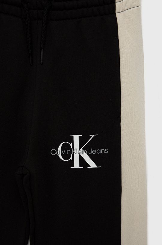 Dětské bavlněné tepláky Calvin Klein Jeans  100% Bavlna