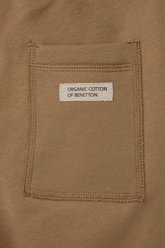 brązowy United Colors of Benetton spodnie dresowe bawełniane dziecięce