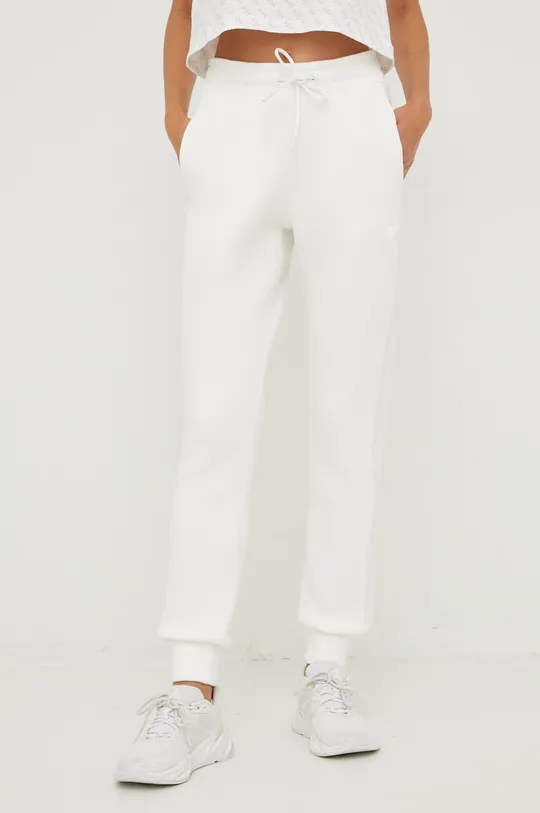 biały Guess spodnie dresowe ALLIE Damski