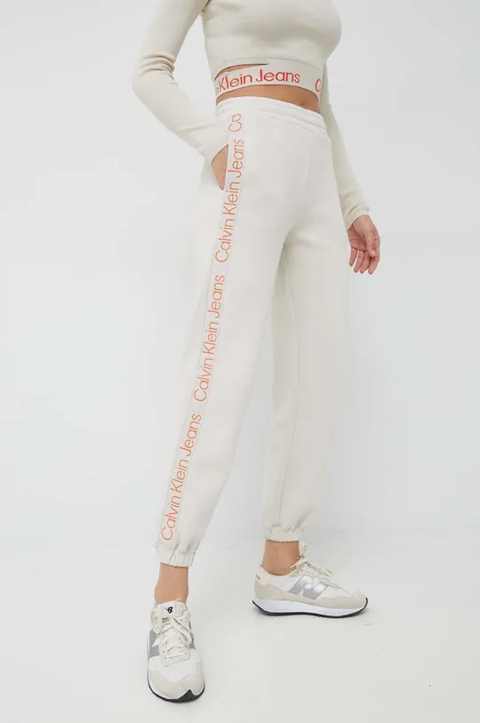 Παντελόνι φόρμας Calvin Klein Jeans μπεζ