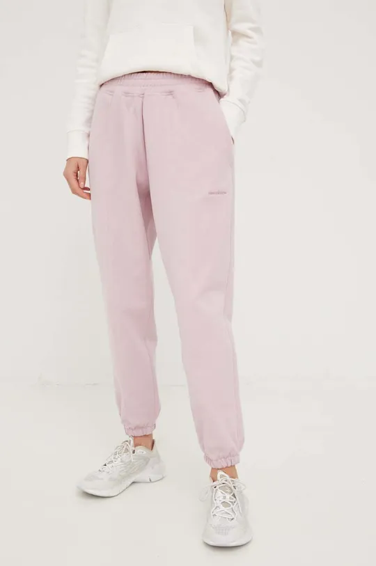 różowy New Balance spodnie dresowe bawełniane Damski