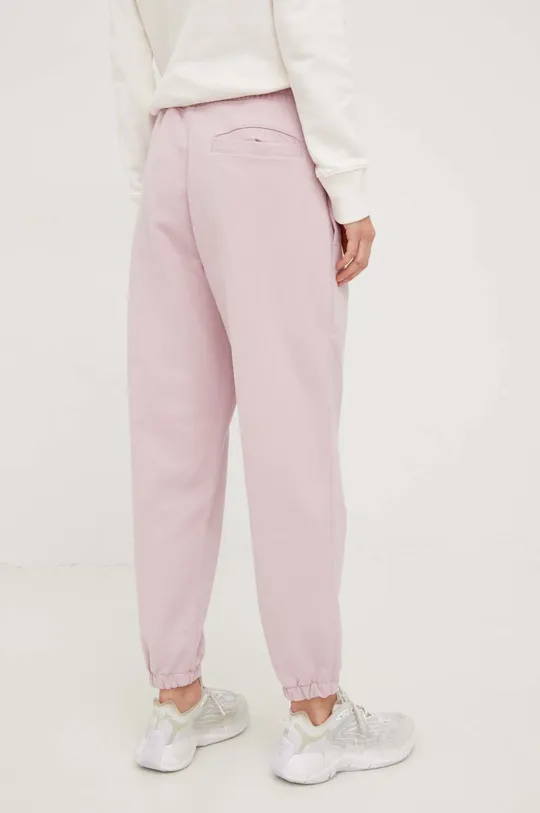 różowy New Balance spodnie dresowe bawełniane