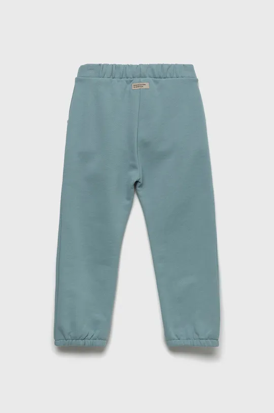 United Colors of Benetton spodnie dresowe bawełniane dziecięce niebieski