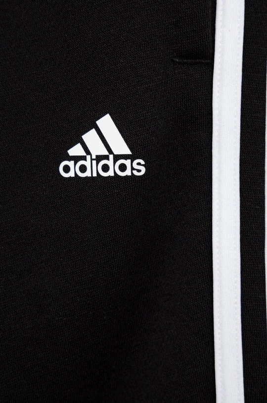 Detské tepláky adidas H65796  70% Bavlna, 30% Recyklovaný polyester