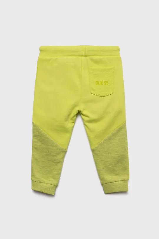 Дитячі спортивні штани Guess жовтий