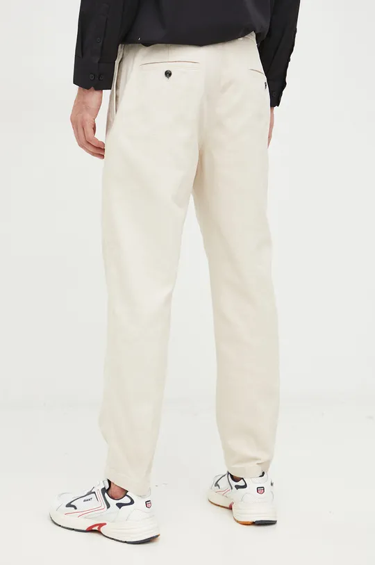 Emporio Armani spodnie bawełniane  Materiał zasadniczy: 100 % Bawełna Podszewka kieszeni: 58 % Poliester, 42 % Bawełna