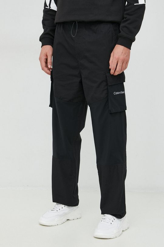 černá Bavlněné kalhoty Calvin Klein Jeans Pánský
