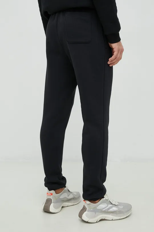 Reebok Classic spodnie dresowe Materiał zasadniczy: 80 % Bawełna organiczna, 20 % Poliester, Podszewka kieszeni: 100 % Bawełna