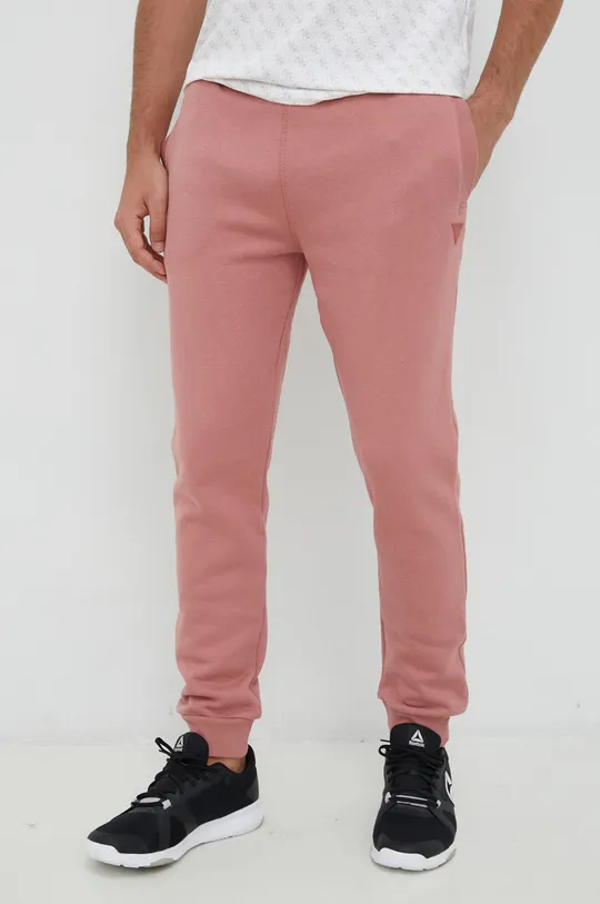 różowy Guess spodnie dresowe ALDWIN Męski