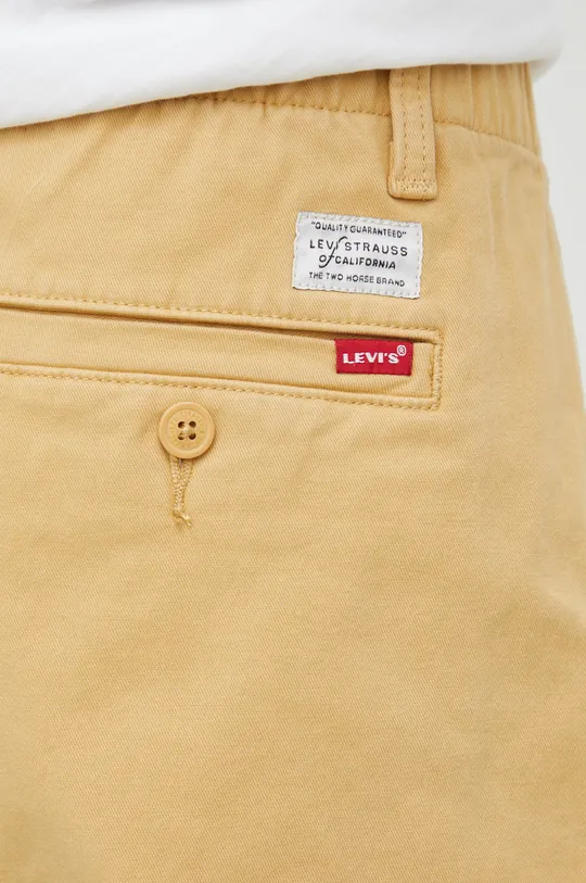 beige Levi's pantaloni