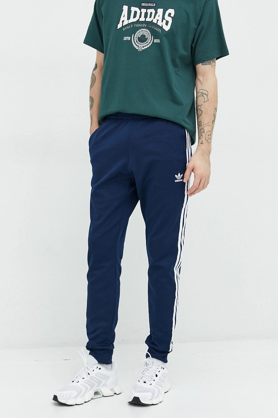 Adidas Originals pantaloni de trening panza bleumarin HK7353