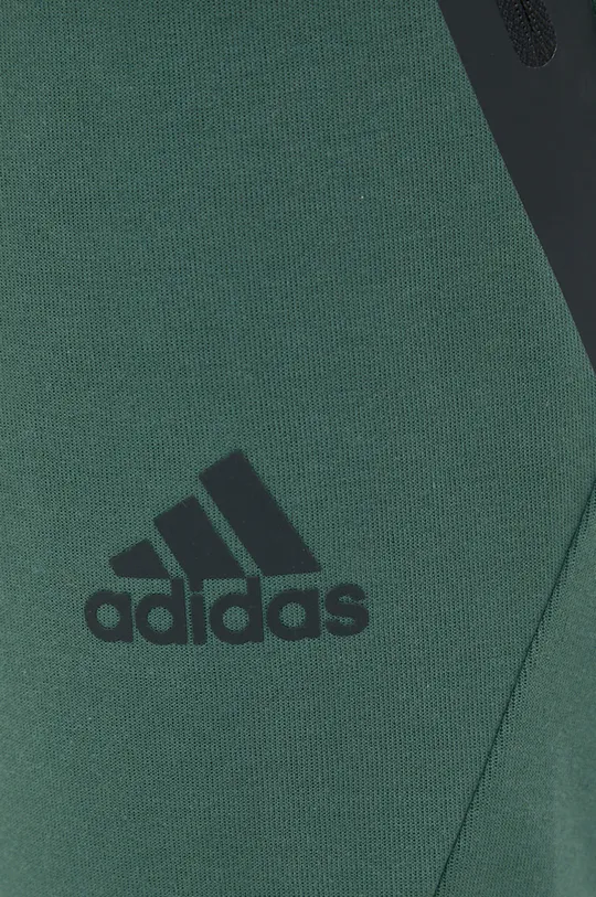 tlumená zelená Tepláky adidas Performance