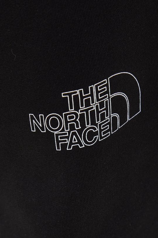černá Bavlněné tepláky The North Face