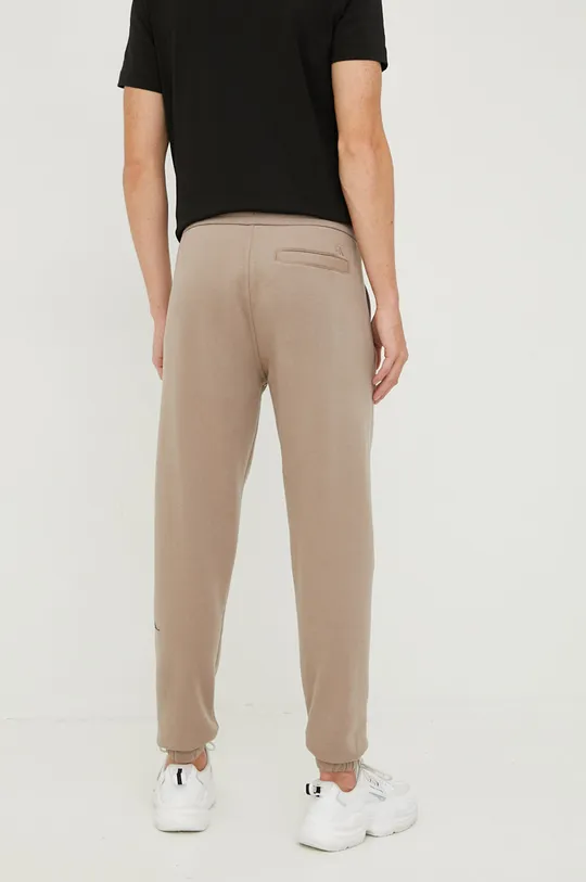 Calvin Klein Jeans spodnie dresowe Materiał zasadniczy: 55 % Bawełna, 45 % Poliester, Ściągacz: 53 % Bawełna, 44 % Poliester, 3 % Elastan
