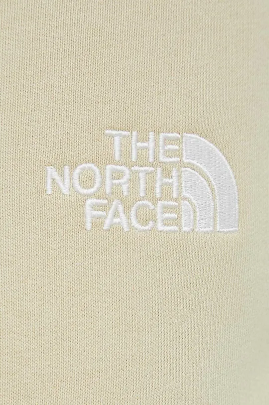 beżowy The North Face spodnie dresowe bawełniane