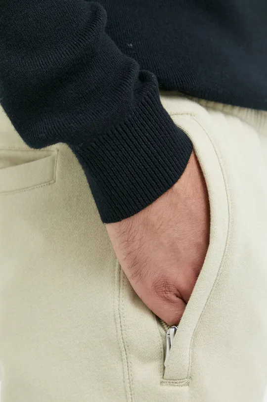beżowy Superdry spodnie dresowe bawełniane