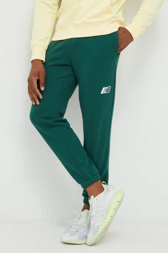 ciemny zielony New Balance spodnie dresowe Męski