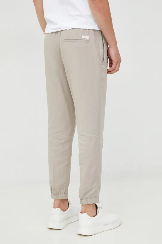 Calvin Klein spodnie dresowe z domieszką lnu Materiał zasadniczy: 78 % Wiskoza, 22 % Len, Podszewka kieszeni: 100 % Bawełna