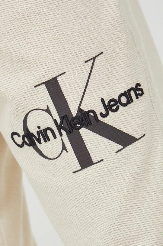 beżowy Calvin Klein Jeans spodnie dresowe bawełniane