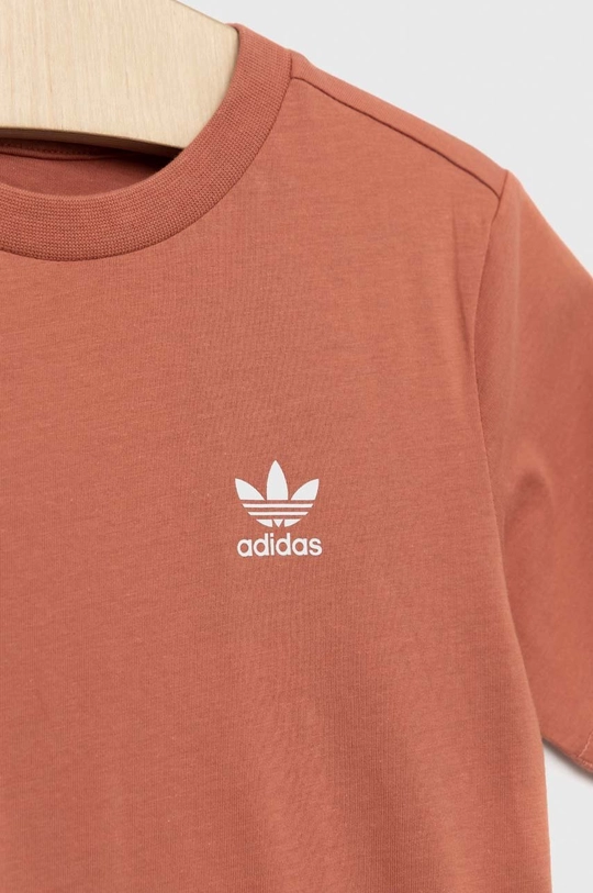 παιδικό βαμβακερό μπλουζάκι adidas Originals  Κύριο υλικό: 100% Βαμβάκι Πλέξη Λαστιχο: 95% Βαμβάκι, 5% Σπαντέξ