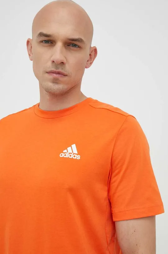 pomarańczowy adidas Performance t-shirt treningowy Designed to Move