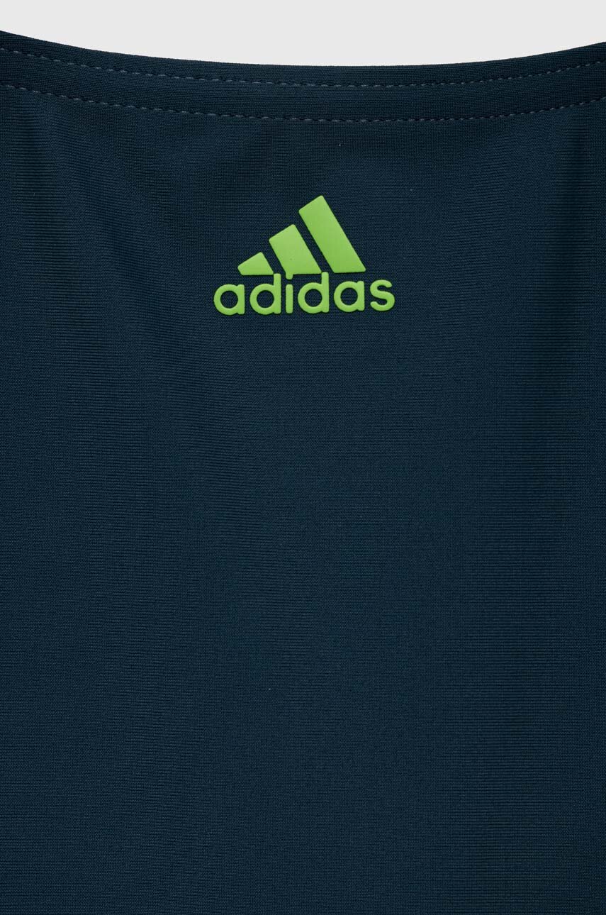 Детский слитный купальник adidas Performance  Основной материал: 78% Полиамид, 22% Эластан Подкладка: 100% Полиэстер