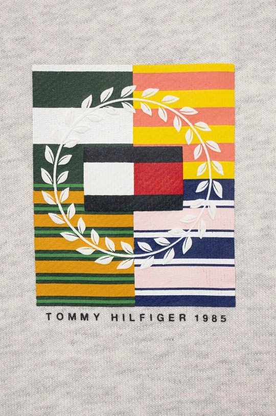 Otroški pulover Tommy Hilfiger  Glavni material: 88 % Bombaž, 12 % Poliester Patent: 95 % Bombaž, 5 % Elastan