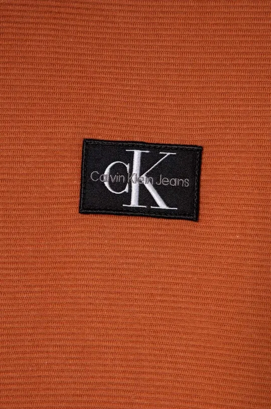 Detská bavlnená mikina Calvin Klein Jeans  Základná látka: 100 % Bavlna Elastická manžeta: 95 % Bavlna, 5 % Elastan