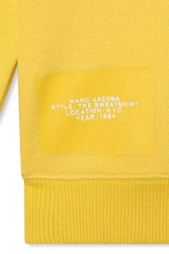 Otroški pulover Marc Jacobs  Glavni material: 98 % Bombaž, 2 % Elastan Patent: 87 % Bombaž, 13 % Poliester