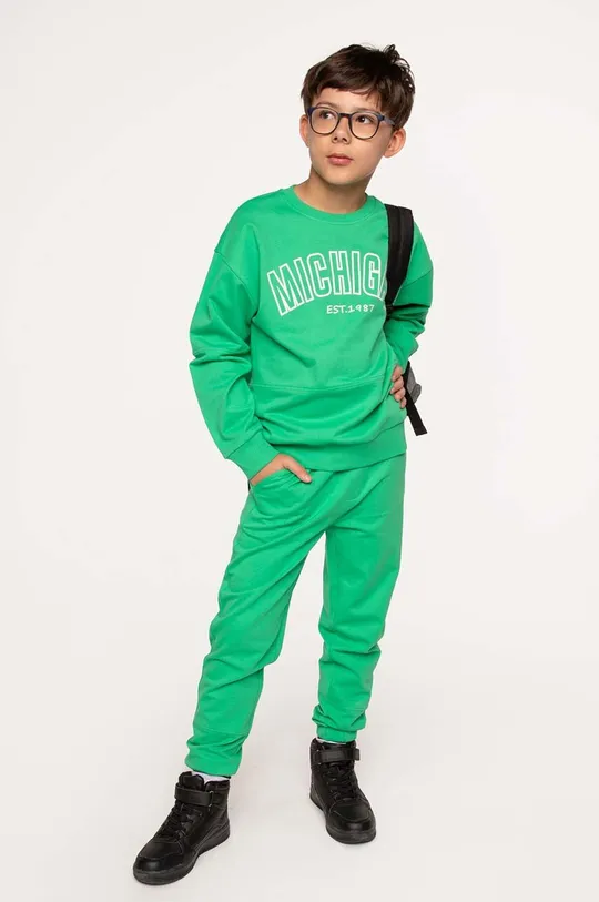 πράσινο Παιδική βαμβακερή μπλούζα Coccodrillo Παιδικά