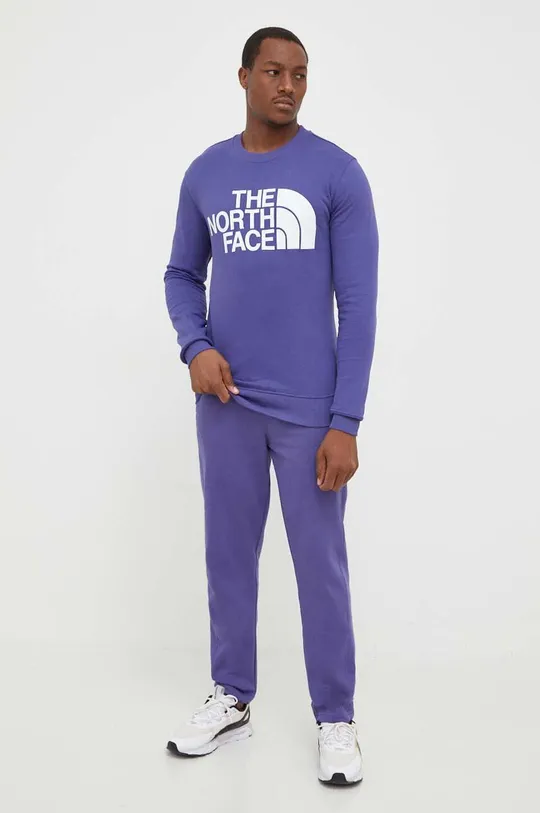 Bombažen pulover The North Face vijolična