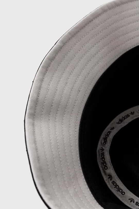 Шляпа из хлопка adidas Originals  Основной материал: 100% Хлопок Подкладка: 100% Переработанный полиэстер Вставки: 100% Хлопок