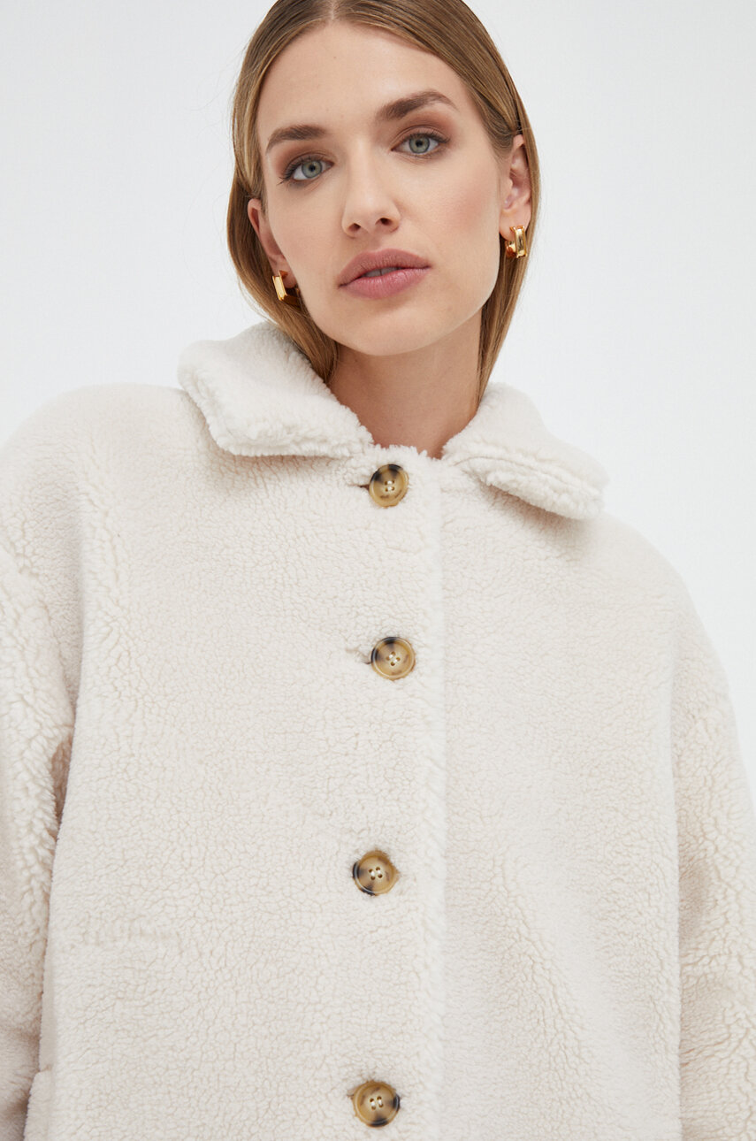 Пальто Guess Guess x Banksy жіноче колір бежевий перехідне oversize ...