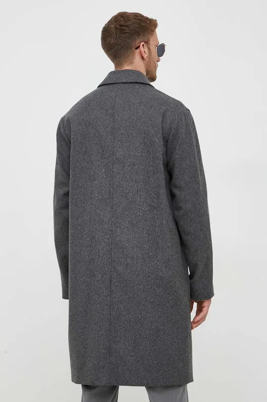 Шерстяное пальто Calvin Klein Основной материал: 79% Шерсть, 21% Полиамид Подкладка: 52% Полиэстер, 48% Вискоза