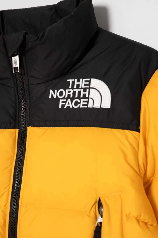 Otroška puhovka The North Face 1996 RETRO NUPTSE JACKET  Podloga: 100 % Poliester Polnilo: 90 % Puh, 10 % Perje Material 1: 100 % Poliester Material 2: 100 % Najlon