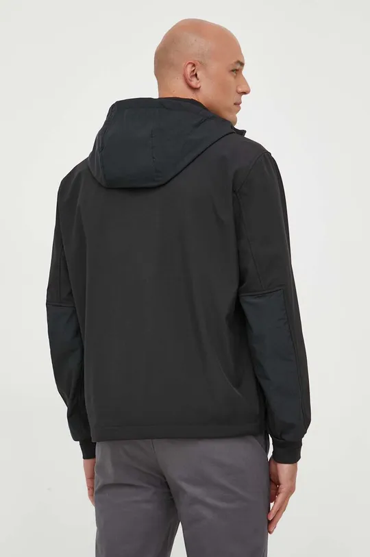 Calvin Klein rövid kabát  Jelentős anyag: 100% poliészter Bélés: 100% poliamid Szegély: 98% poliészter, 2% elasztán