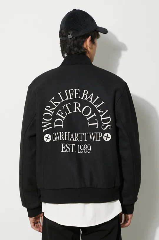 Carhartt WIP bomber jacket Insole: 100% Nylon Main: 70% Polyester, 30% Wool Rib-knit waistband: 87% Cotton, 10% Nylon, 3% Elastane